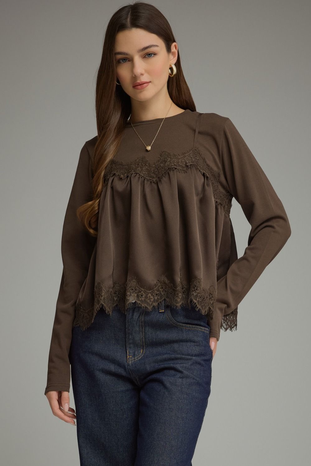 Solid long sleeve top and layered camisole detail